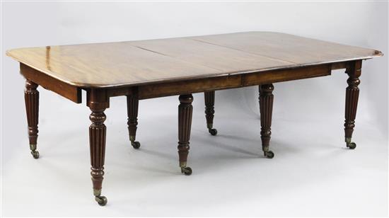A 19th century mahogany extending dining table, 11ft 6in. x 4ft 6in.